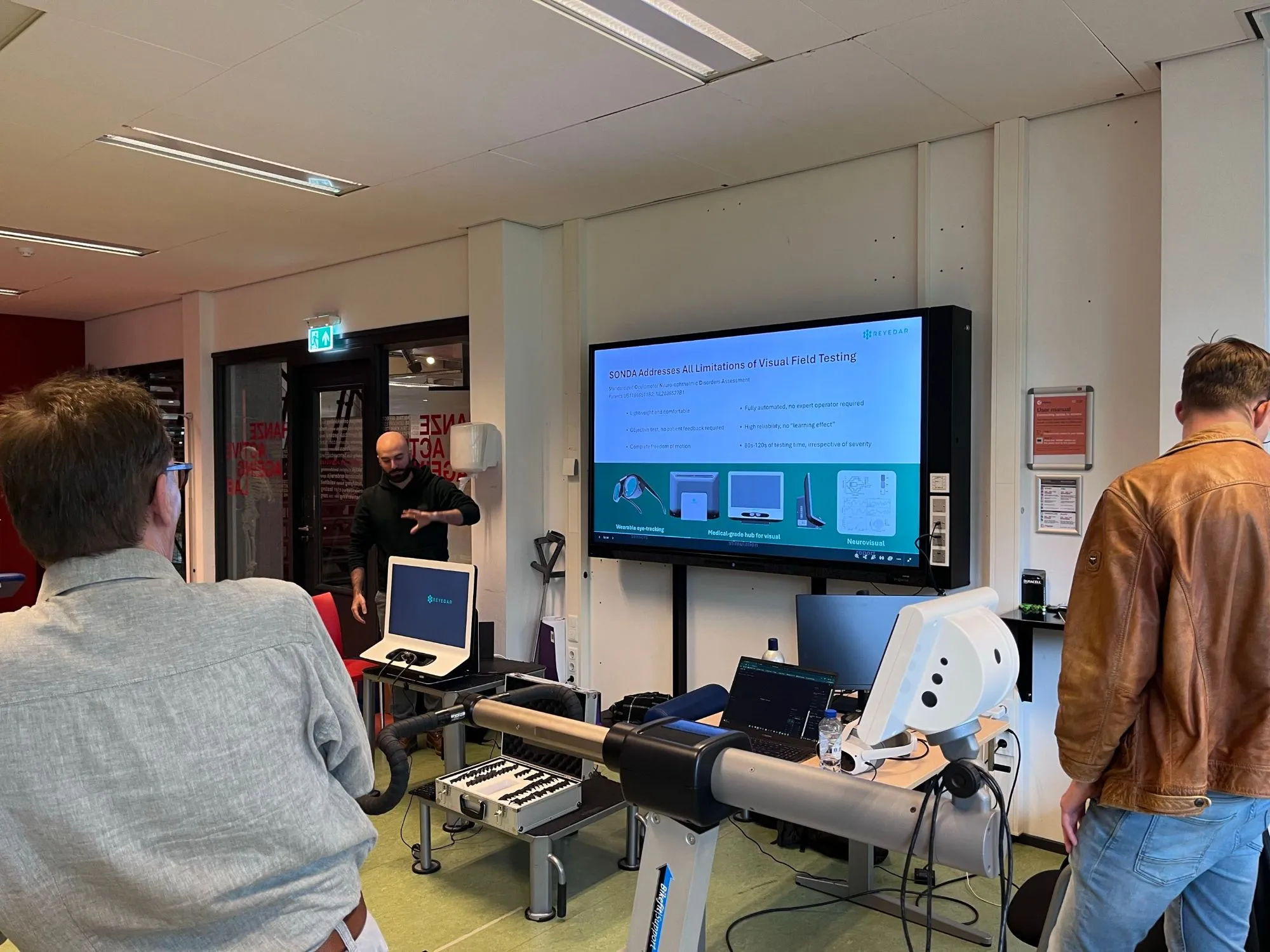 Presenting SONDA next to the SONDA Hub, with a slide on the limitations of visual field testing